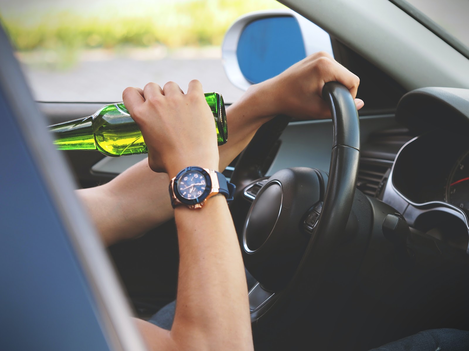 A driver drinking while driving